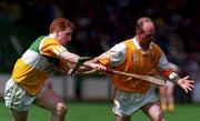 26 July 1998; Jarlath Elliot of Antrim in action against Simon Whelahan of Offaly during the Guinness All-Ireland Senior Hurling Championship Quarter-Final match between Offaly and Antrim at Croke Park in Dublin. Photo by Damien Eagers/Sportsfile