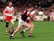 23 August 1998; John Divilly of Galway in action against Gary McGill of Derry during the Bank of Ireland All-Ireland Senior Football Championship semi-final match between Galway and Derry at Croke Park in Dublin. Photo by Brendan Moran/Sportsfile