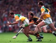 13 September 1998; Johnny Dooley of Offaly, supported by team-mate Joe Dooley, in action against Willie O'Connor of Kilkenny during the Guinness All-Ireland Senior Hurling Championship Final match between Offaly and Kilkenny at Croke Park in Dublin. Photo by Brendan Moran/Sportsfile