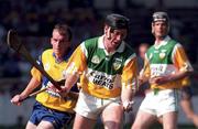9 August 1998; Brian Whelahan of Offaly in action against Fergie Tuohy of Clare during the Guinness All-Ireland Senior Hurling Championship semi-final match between Offaly and Clare at Croke Park in Dublin. Photo by Brendan Moran/Sportsfile