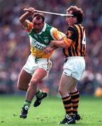 13 September 1998; Johnny Dooley of Offaly in action against Willie O'Connor of Kilkenny during the Guinness All-Ireland Senior Hurling Championship Final match between Offaly and Kilkenny at Croke Park in Dublin. Photo by Brendan Moran/Sportsfile