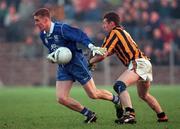 22 November 1998; Joseph Cassidy of Crossmaglen Rangers is tackled by Martin Califfe of Bellaghy during the AIB Ulster Senior Club Football Championship final between Crossmaglen Rangers and Bellaghy at Scotstown GAA Club in Scotstown, Monaghan. Photo by Matt Browne/Sportsfile