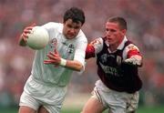 27 September 1998; Karl O'Dwyer of Kildare in action against Sean Og De Paor of Galway during the All-Ireland Senior Football Final match between Galway and Kildare at Croke Park in Dublin. Photo by Ray McManus/Sportsfile