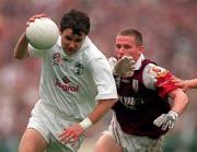 27 September 1998; Karl O'Dwyer of Kildare in action against Sean Og De Paor of Galway during the All-Ireland Senior Football Final match between Galway and Kildare at Croke Park in Dublin. Photo by Ray McManus/Sportsfile