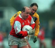 6 December 1998; Leo Turley of Éire Og in action against Conor Deegan of Kilmacud Crokes during the AIB Leinster Club Football Championship Final between Kilmacud Crokes and Éire Og at St Conleth's Park in Newbridge, Kildare. Photo by Ray McManus/Sportsfile
