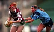 25 October 1998; Madeline Murtagh of Westmeath in action against Maria Kavanagh of Dublin during the Ladies National Football League Division 2 match between Dublin and Westmeath at Croke Park in Dublin. Photo by Ray McManus/Sportsfile