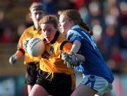 25 October 1998; Mairead Kelly of Monaghan in action against Geraldine O'Ryan of Waterford during the All-Ireland Senior Ladies' Football Championship Final Replay match between Waterford and Monaghan at Croke Park in Dublin. Photo by Brendan Moran/Sportsfile