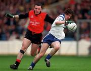 5 April 1998; Mark Daly of Monaghan in action against Michael Magill of Down during the Church & General National Football League quarter-final match between Down and Monaghan at Croke Park in Dublin. Photo by Ray McManus/Sportsfile