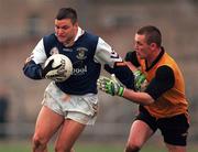 8 November 1998; Mick O'Keeffe of Kilmacud Crokes is tackled by Martin O'Toole of St. Peters, Dunboyne, during the AIB Leinster Club Football Championship Second Round match between Kilmacud Crokes and St. Peters at Páirc Tailteann in Navan, Meath. Photo by David Maher/Sportsfile