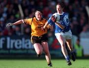 25 October 1998; Mary O'Donnell of Waterford in action against Eileen McElvaney of Monaghan during the All-Ireland Senior Ladies' Football Championship Final Replay match between Waterford and Monaghan at Croke Park in Dublin. Photo by Brendan Moran/Sportsfile