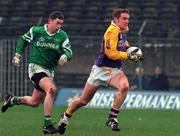 22 November 1998; Maurice Leahy of Kilmacud Crokes in action against Greg Ramsbottom of Stradbally during the AIB Leinster Club Football Semi-Final match between Kilmacud and Stradbally at O'Connor Park in Tullamore, Offaly. Photo by David Maher/Sportsfile