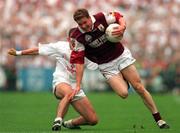 27 September 1998; Michael Donnellan of Galway in action against Brian Lacey of Kildare during the All-Ireland Senior Football Final match between Galway and Kildare at Croke Park in Dublin. Photo by Brendan Moran/Sportsfile