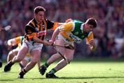 13 September 1998; Michael Duignan of Offaly in action against Charlie Carter of Kilkenny during the Guinness All-Ireland Senior Hurling Championship Final match between Offaly and Kilkenny at Croke Park in Dublin. Photo by Brendan Moran/Sportsfile