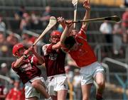 19 September 1998; Joe Hession, left, and Michael J Quinn of Galway in action against Alan Hayes of Cork during the Vocational Schools GAA Hurling Final between Galway and Cork at Semple Stadium in Thurles, Tipperary. Photo by Ray McManus/Sportsfile
