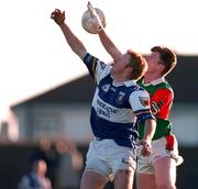 15 November 1998; Michael Lawlor of Laois in action against Kevin Cahill of Mayo during the Church & General National Football League Round 2 match between Laois and Mayo at Fr. Maher Park in Graiguecullen, Laois. Photo by Brendan Moran/Sportsfile