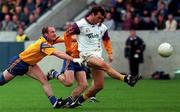 10 October 1998; Mick Dillon of Kilmacud Crokes in action against Leo Fay of Na Fianna during the Dublin Senior Club Football Championship Final match between Kilmacud Crokes and Na Fianna at Parnell Park in Dublin. Photo by Ray Lohan/Sportsfile