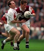 27 September 1998; Niall Finnegan of Galway in action against Declan Kerrigan of Kildare during the All-Ireland Senior Football Final match between Galway and Kildare at Croke Park in Dublin. Photo by Ray McManus/Sportsfile