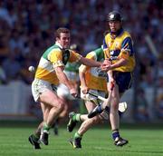 9 August 1998; Niall Gilligan of Clare is tackled by Kevin Martin of Offaly during the Guinness All-Ireland Senior Hurling Championship semi-final match between Offaly and Clare at Croke Park in Dublin. Photo by Brendan Moran/Sportsfile