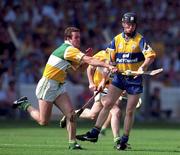 9 August 1998; Niall Gilligan of Clare is tackled by Kevin Martin of Offaly during the Guinness All-Ireland Senior Hurling Championship semi-final match between Offaly and Clare at Croke Park in Dublin. Photo by Brendan Moran/Sportsfile