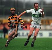 13 December 1998; Niall Rigney of Portlaoise in action against Austin Wood of Rathnure during the AIB Leinster Club Hurling Championship Final match between Rathnure and Portlaoise at Nowlan Park in Kilkenny. Photo by Ray McManus/Sportsfile