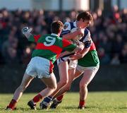 15 November 1998; Noel Garvan of Laois in action against James Nallen of Mayo during the Church & General National Football League Round 2 match between Laois and Mayo at Fr. Maher Park in Graiguecullen, Laois. Photo by Brendan Moran/Sportsfile