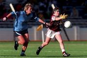 25 October 1998; Nuala Farrell of Westmeath in action against Angie McNally of Dublin during the Ladies National Football League Division 2 match between Dublin and Westmeath at Croke Park in Dublin. Photo by Ray McManus/Sportsfile
