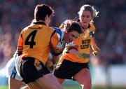 25 October 1998; Olivia Condon of Waterford in action against Audrey O'Reilly, left, and Jennifer Treanor of Monaghan during the All-Ireland Senior Ladies' Football Championship Final Replay match between Waterford and Monaghan at Croke Park in Dublin. Photo by Ray McManus/Sportsfile