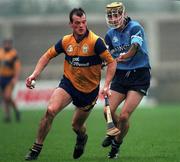 29 March 1998; Ollie Baker of Clare in action against Stephen Perkins of Dublin during the Church & General National Hurling League match between Dublin and Clare in Parnell Park in Dublin. Photo by Ray McManus/Sportsfile