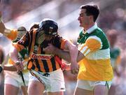 13 September 1998; PJ Delaney of Kilkenny in action against Kevin Kinahan of Offaly during the Guinness All-Ireland Senior Hurling Championship Final match between Offaly and Kilkenny at Croke Park in Dublin. Photo by Brendan Moran/Sportsfile