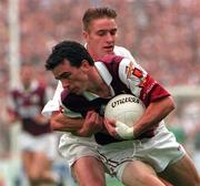 27 September 1998; Padraic Joyce of Galway is tackled by Eddie McCormack of Kildare during the All-Ireland Senior Football Final match between Galway and Kildare at Croke Park in Dublin. Photo by Ray McManus/Sportsfile