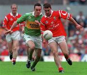 5 July 1998; Owen Sexton of Cork in action against Pa Laide of Kerry during the Bank of Ireland Munster Senior Football Championship semi-final match between Kerry and Cork at Fitzgerald Stadium in Killarney, Kerry. Photo by Brendan Moran/Sportsfile