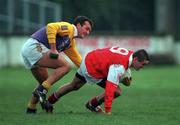 6 December 1998; Paul Doyle of Éire Og is tackled by Jonathan Magee of Kilmacud Crokes during the AIB Leinster Club Football Championship Final between Kilmacud Crokes and Éire Og at St Conleth's Park in Newbridge, Kildare. Photo by Ray McManus/Sportsfile