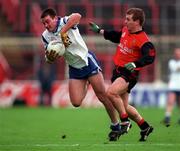 5 April 1998; Padraig McShane of Monaghan in action against James McCartan of Down during the Church & General National Football League quarter-final match between Down and Monaghan at Croke Park in Dublin. Photo by Ray McManus/Sportsfile