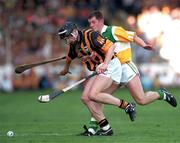 13 September 1998; Peter Barry of Kilkenny in action against Paudie Mulhare of Offaly during the Guinness All-Ireland Senior Hurling Championship Final match between Offaly and Kilkenny at Croke Park in Dublin. Photo by Brendan Moran/Sportsfile