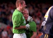 18 October 1998; Ireland's Peter Canavan, right, celebrates with team-mate Anthony Tohill after scoring a six pointer in the 2nd quarter, during the International Rules match between Ireland and Australia at Croke Park in Dublin. Photo by Damien Eagers/Sportsfile