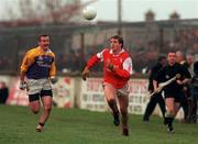 6 December 1998; Peter Kingston of Éire Og in action against Pat Burke of Kilmacud Crokes during the AIB Leinster Club Football Championship Final between Kilmacud Crokes and Éire Og at St Conleth's Park in Newbridge, Kildare. Photo by Aoife Rice/Sportsfile