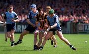 31 May 1998; Stephen Perkins, left, and Conor McCann of Dublin in action against Philip Larkin of Kilkenny during the Guinness Leinster Senior Hurling Championship quarter-final match between Dublin and Kilkenny at Parnell Park in Dublin. Photo by Brendan Moran/Sportsfile