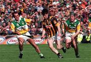 13 September 1998; Philip Larkin of Kilkenny in action against Johnny Dooley of Offaly during the Guinness All-Ireland Senior Hurling Championship Final match between Offaly and Kilkenny at Croke Park in Dublin. Photo by David Maher/Sportsfile