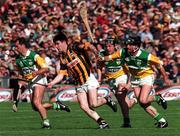 13 September 1998; Philip Larkin of Kilkenny in action against Offaly players, from left, Johnny Dooley, Billy Dooley and Joe Errity, during the Guinness All-Ireland Senior Hurling Championship Final match between Offaly and Kilkenny at Croke Park in Dublin. Photo by David Maher/Sportsfile