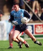 1 November 1998: Ray Cosgrove of Dublin in action against Fay Devlin of Tyrone during the Church & General National League Football match between Dublin and Tyrone at Parnell Park in Dublin. Photo by Ray McManus/Sportsfile