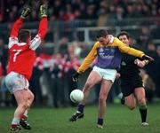 6 December 1998; Ray Cosgrove of Kilmacud Crokes in action against Alan Callinan of Éire Og during the AIB Leinster Club Football Championship Final between Kilmacud Crokes and Eire Og at St Conleth's Park in Newbridge, Kildare. Photo by Ray McManus/Sportsfile