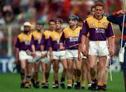 13 July 1997; Wexford captain Rod Guiney leads his team through the pre-match parade ahead of the Guinness Leinster Senior Hurling Championship Final match between Wexford and Kilkenny at Croke Park in Dublin. Photo by Ray McManus/Sportsfile