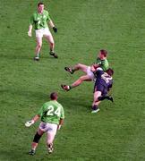 18 October 1998; Sean og De Paor of ireland supported by team-mates Jarlath Fallon, top, and Glenn Ryan, 24, in action against Wayne Campbell of Australia during the International Rules match between Ireland and Australia at Croke Park in Dublin. Photo by Brendan Moran/Sportsfile