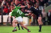 18 October 1998; Sean óg De Paor of Ireland in action against Wayne Campbell of Australia during the International Rules match between Ireland and Australia at Croke Park in Dublin. Photo by Ray McManus/Sportsfile