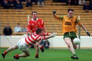 5 April 1998; Shane Carr of Donegal in action against Cork goalkeeper Michael Maguire during the Church & General National Football League quarter-final match between Cork and Donegal at Croke Park in Dublin. Photo by Ray Lohan/Sportsfile