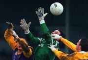 22 November 1998; Tom Bowe of Stradbally in action against Jonathan Magee, left, and Colin Redmond of Kilmacud Crokes during the AIB Leinster Club Football Semi-Final match between Kilmacud and Stradbally at O'Connor Park in Tullamore, Offaly. Photo by David Maher/Sportsfile