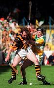 13 September 1998; Willie O'Connor of Kilkenny in action against Billy Dooley of Offaly during the Guinness All-Ireland Senior Hurling Championship Final between Offaly and Kilkenny at Croke Park in Dublin. Photo by David Maher/Sportsfile