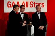 29 November 2002; Paddy Christie, Dublin, is presented with his All-Star award by GAA President Sean McCague and Paul Donovan, Chief Executive, Vodafone, at the VODAFONE GAA All-Star Awards in the Citywest Hotel, Dublin. Football. Hurling. Picture credit; Ray McManus / SPORTSFILE *EDI*