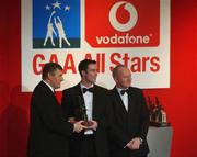 29 November 2002; Ray Cosgrove, Dublin, is presented with his All-Star award by GAA President Sean McCague and Paul Donovan, Chief Executive, Vodafone, at the VODAFONE GAA All-Star Awards in the Citywest Hotel, Dublin. Football. Hurling. Picture credit; Ray McManus / SPORTSFILE *EDI*