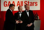 29 November 2002; Peter Canavan, Tyrone, is presented with his All-Star award by GAA President Sean McCague and Paul Donovan, Chief Executive, Vodafone, at the VODAFONE GAA All-Star Awards in the Citywest Hotel, Dublin. Football. Hurling. Picture credit; Ray McManus / SPORTSFILE *EDI*